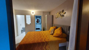 Studio havre aux hibiscus avec piscine proche de la mer